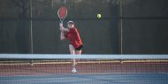 Hesston College women's tennis action photo