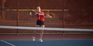 Hesston College women's tennis action photo