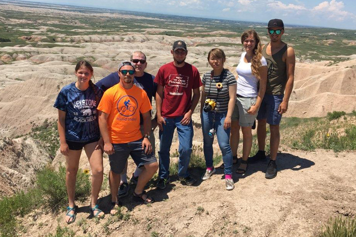 Disaster Management students serving in Pine Ridge, S.D., take time out of their work to visit the Badlands.