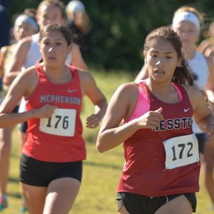 Hesston College women's cross country action photo - Sam Trejo
