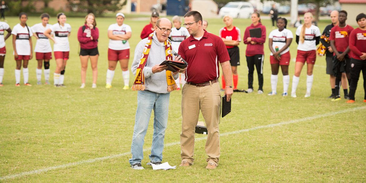 Gerry Sieber addresses the crowd at the dedication of Sieber Field.