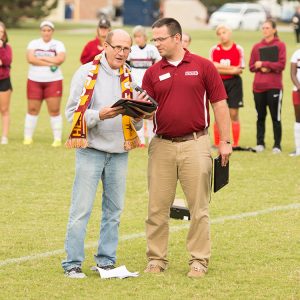 Gerry Sieber addresses the crowd at the dedication of Sieber Field.