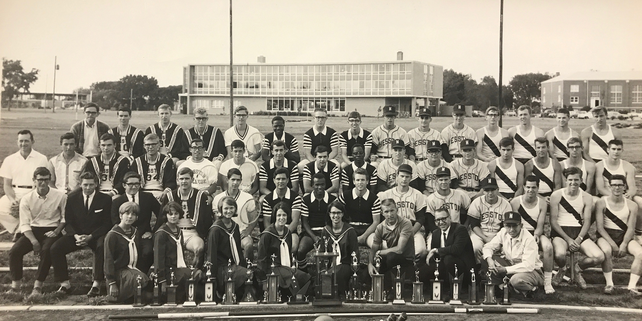 Student-athletes who won conference honors circa 1960s. Oswald is front row, right.