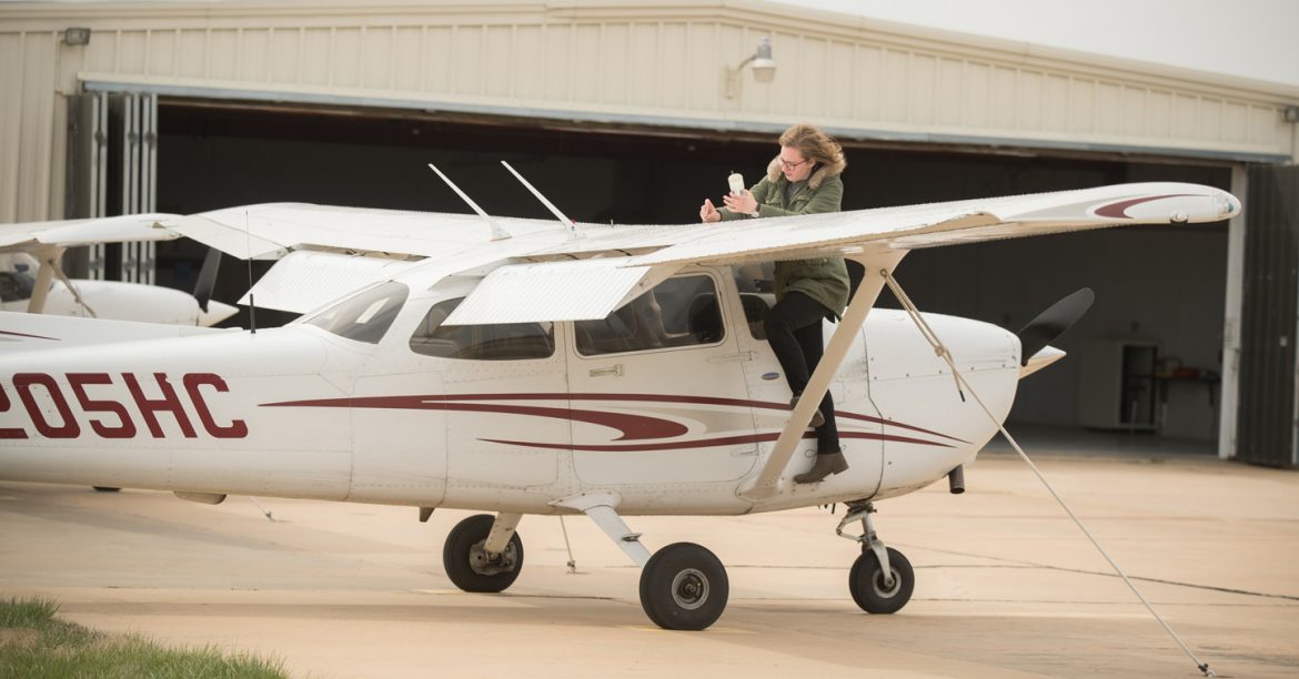 Hesston College Aviation student, Gracie Hochstetler (Leesburg, Ind.), goes through pre-flight checks on one of the college’s planes. Hesston College Aviation recently entered into a partnership with passenger airline company SkyWest Airlines that will give Hesston graduates connections and a more streamlined and efficient pathway to transition into a flying career.