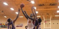 Hesston College men's basketball action photo - Derrick Magiya