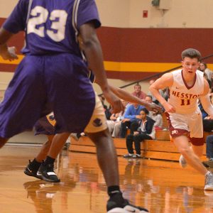 Hesston College men's basketball action photo - Cal Hartley