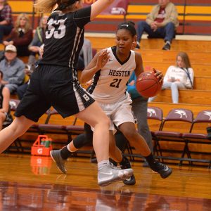 Hesston College women's basketball action photo - Millaya Bray