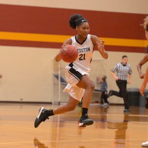Hesston College women's basketball action photo - Millaya Bray