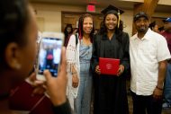 Essence Tolson (Yuma, Colo.) marks the occasion with her family.