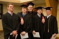 Graduates of the men’s basketball team celebrate together. From left: Grant Harding (Louisburg, Kan.), Kendall Pelton (Cheyenne Wells, Colo.), C.R. Curless (Haysville, Kan.), Braden Handcock (Brighton, Colo.) and Cal Hartley (Benton, Kan.).