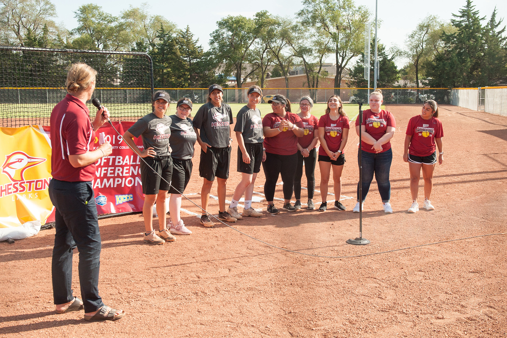 Former Coach Andrew Sharp introduces members of the 2019 Kansas Jayhawk Conference champion Hesston College Larks softball team.