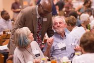 President Manickam talks with Judy (Dorsing) Ac59, ’61 and Cecil Ac57, ’59 Miller at the Partner Luncheon.