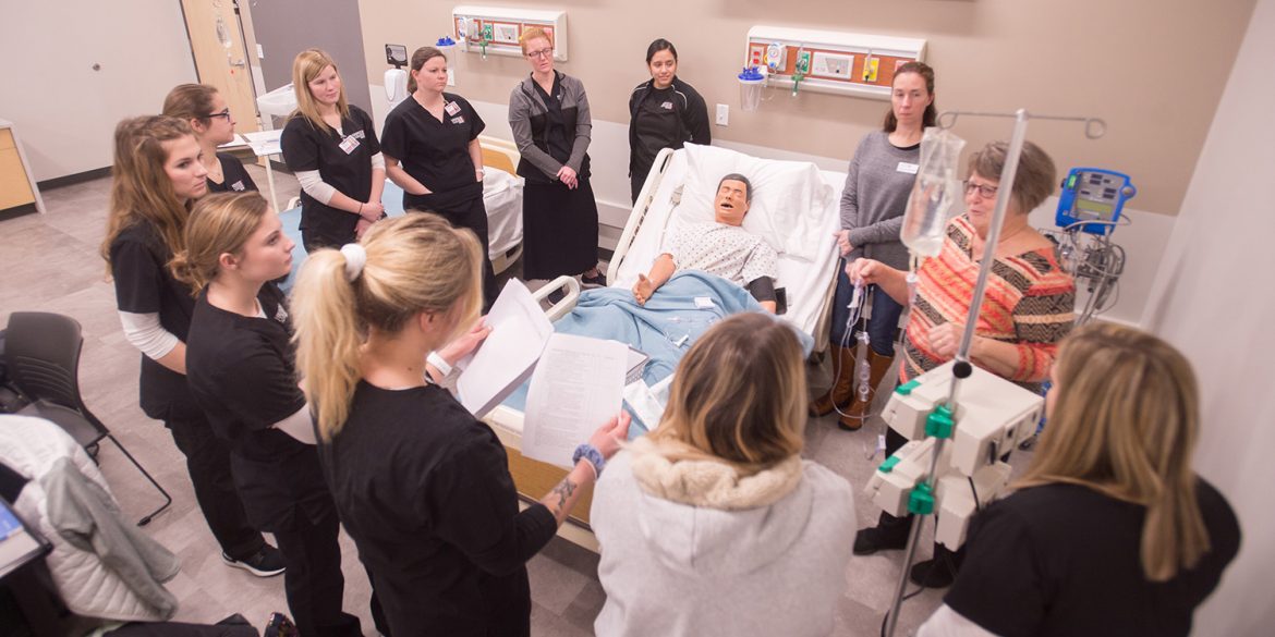 Nursing students participate in a simulation lab on the Hesston College campus.