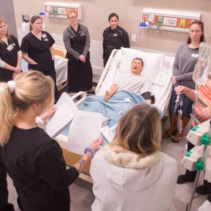 Nursing students participate in a simulation lab on the Hesston College campus.