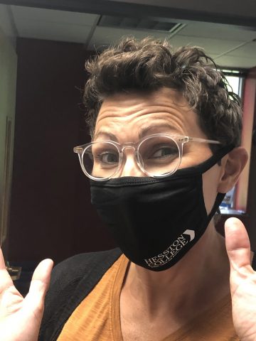 VP of Advancement Rachel Swartzendruber Miller models the new Hesston College face mask.