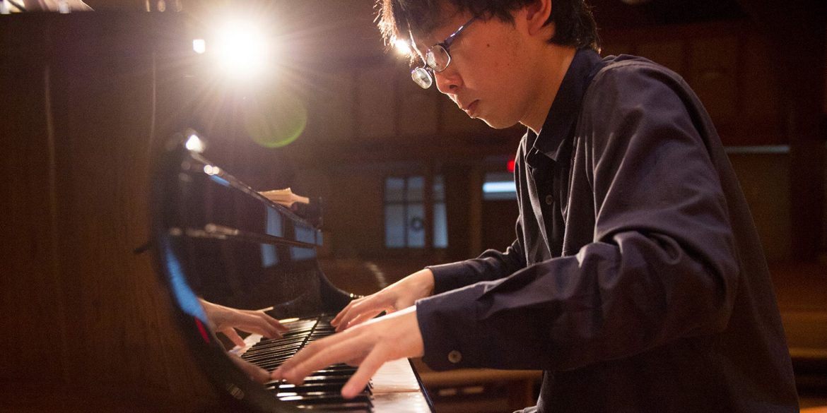 Masataka Miyake practicing piano