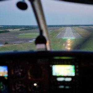 landing a plane at dusk, Newton City-County Airport