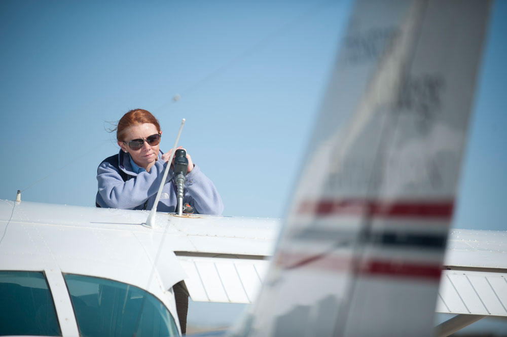 Healther Harkins refuels a Hesston College plane