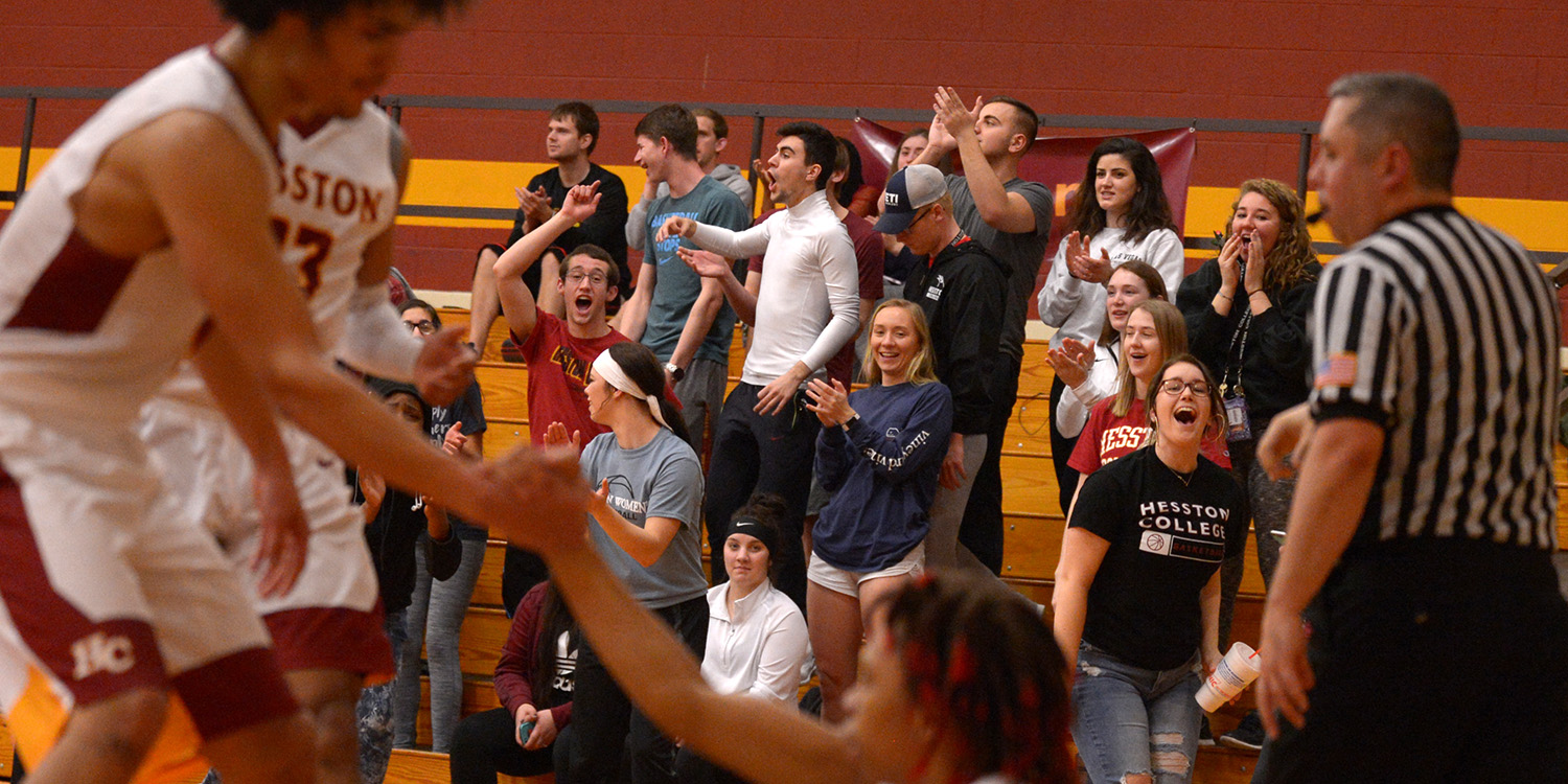 The fans come alive at a Hesston College men's basketball game