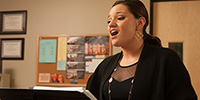 Music Scholarships - a student rehearses during a voice lesson