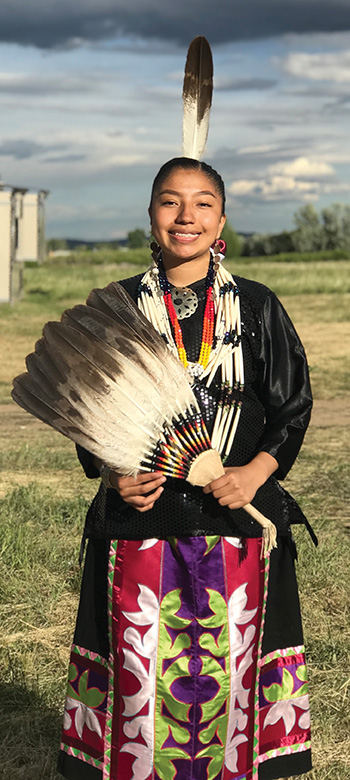 Star Her Many Horses - I'm dressed in my appliqué regalia, which represents my woodland tribes – Meskwaki and Ojibwe. I dance culturally.