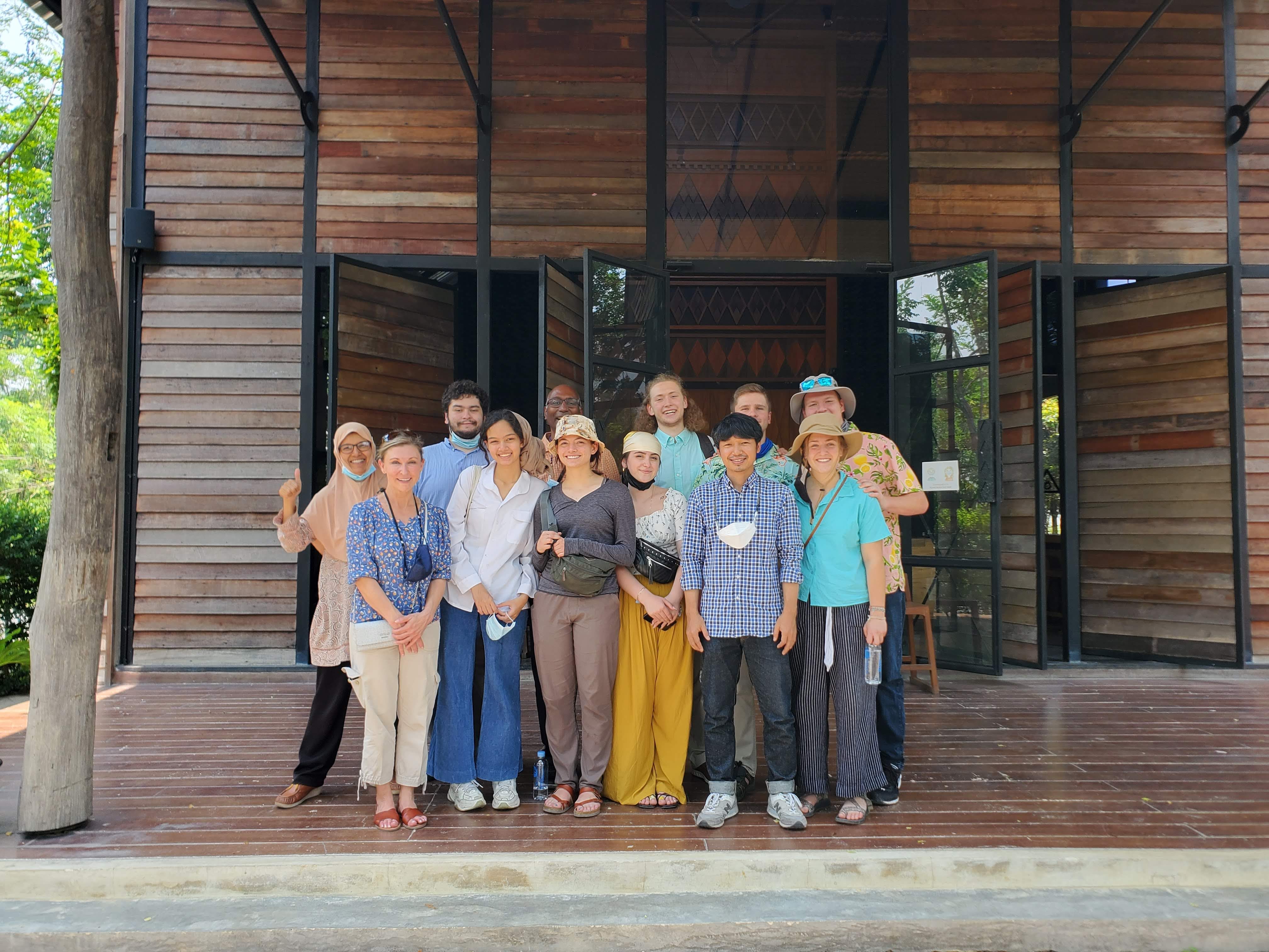 Group photo at Akha Ama Coffee factory