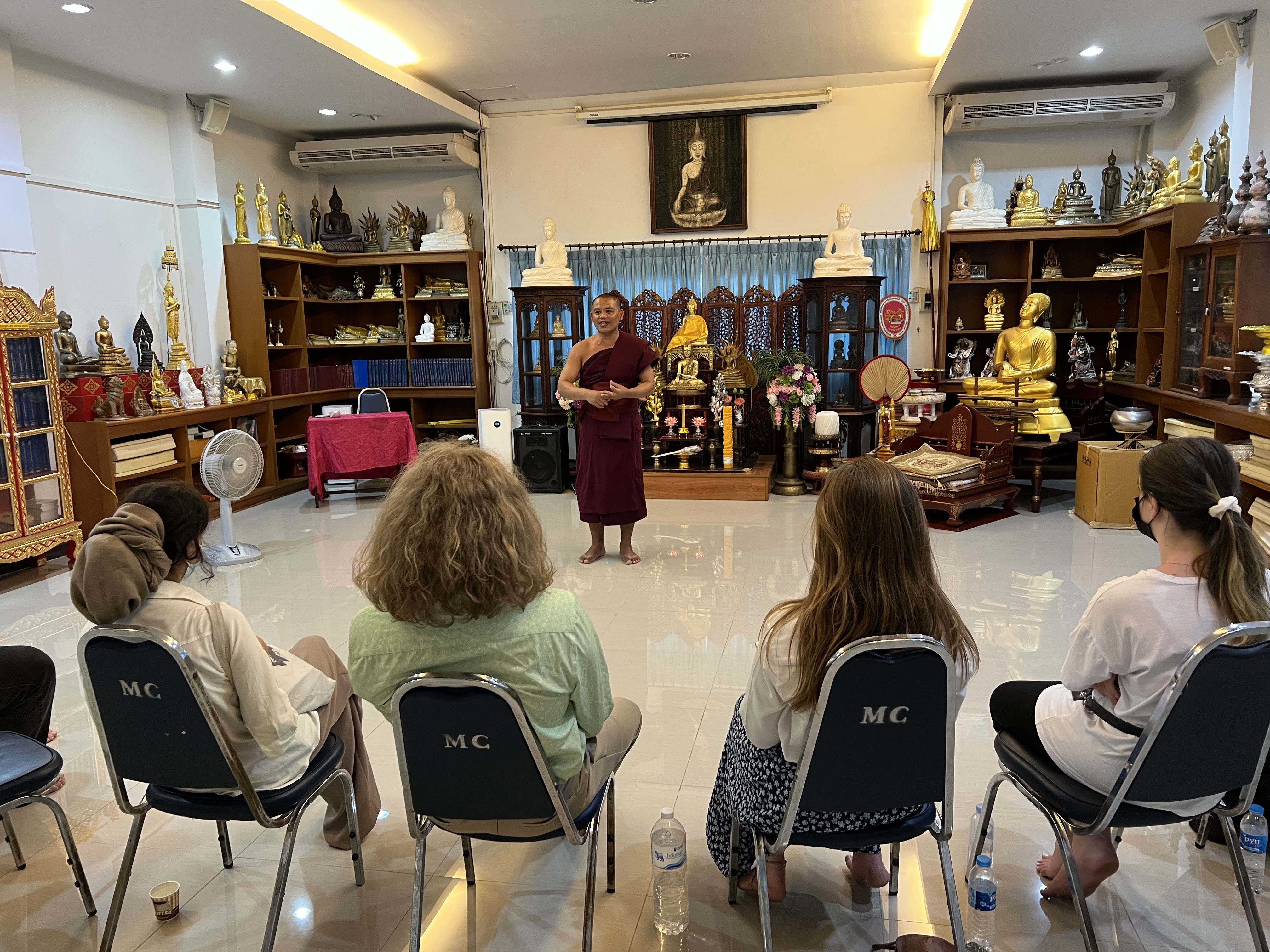 Listenting to a lecture by Abbott KK at Suwan Dok Temple