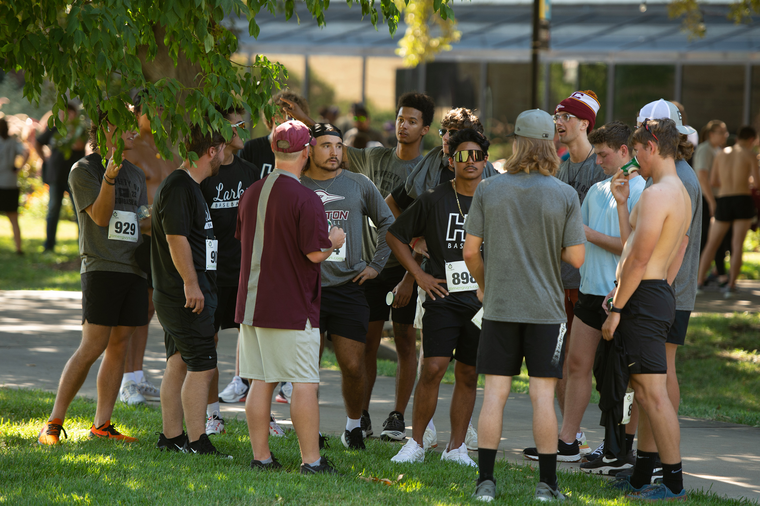 students and alumni visiting after the Manickam Mosey at Hesston College Homecoming 2022