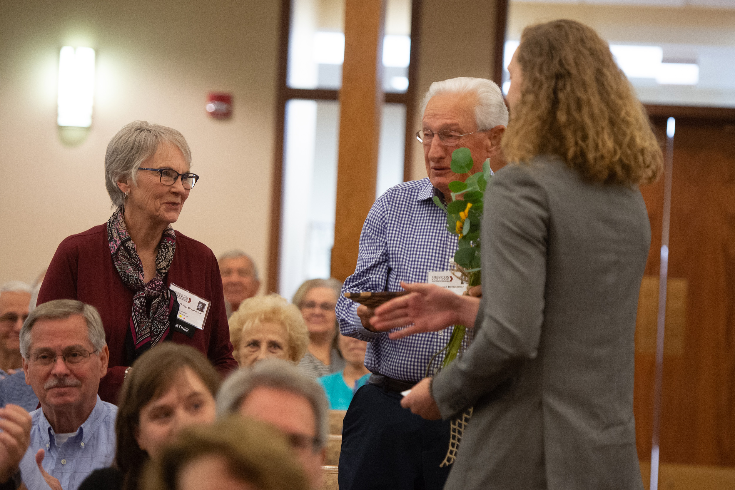 Students presented flowers and special cutting board to charter Partners at the Partner lunch at Hesston College Homecoming 2022