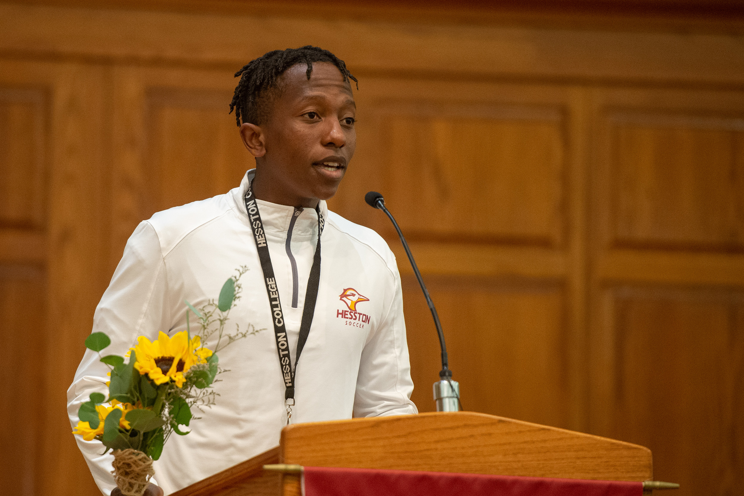 Students presented flowers in honor of all charter Partners at the Partner lunch at Hesston College Homecoming 2022