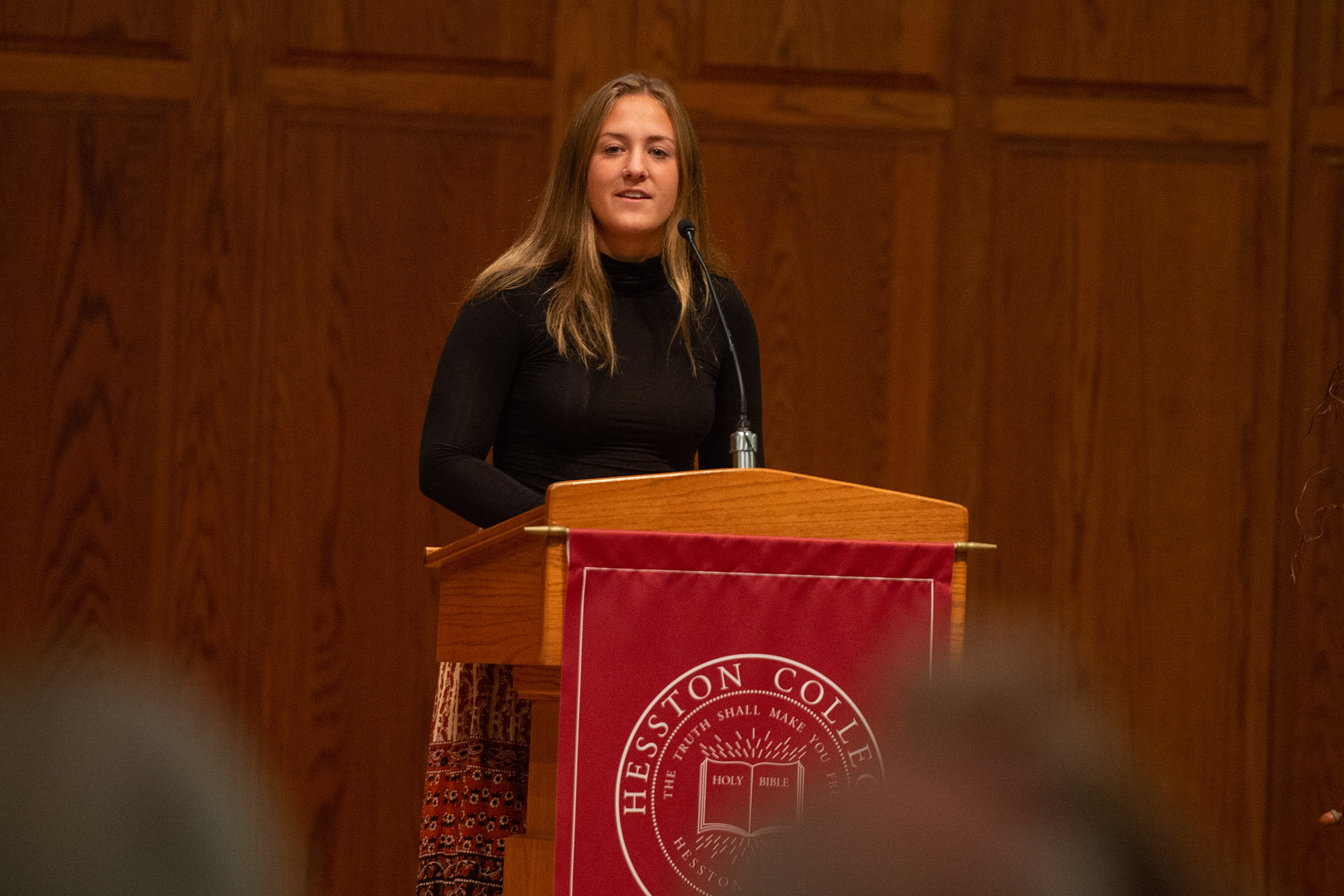 Senior business major Kara Longenecker speaks at Vision 2025 update at Hesston College Homecoming 2022