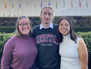 Ginny Miller, Jesse Kanagy and Jessica Raharjo pose for a photo at the United Nations in New York City.