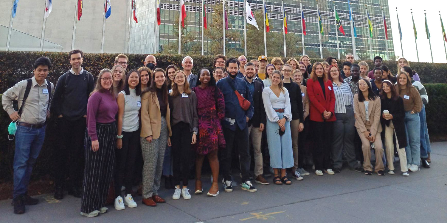 MCC-UN seminar attendees in front of the United Nations building in New York City