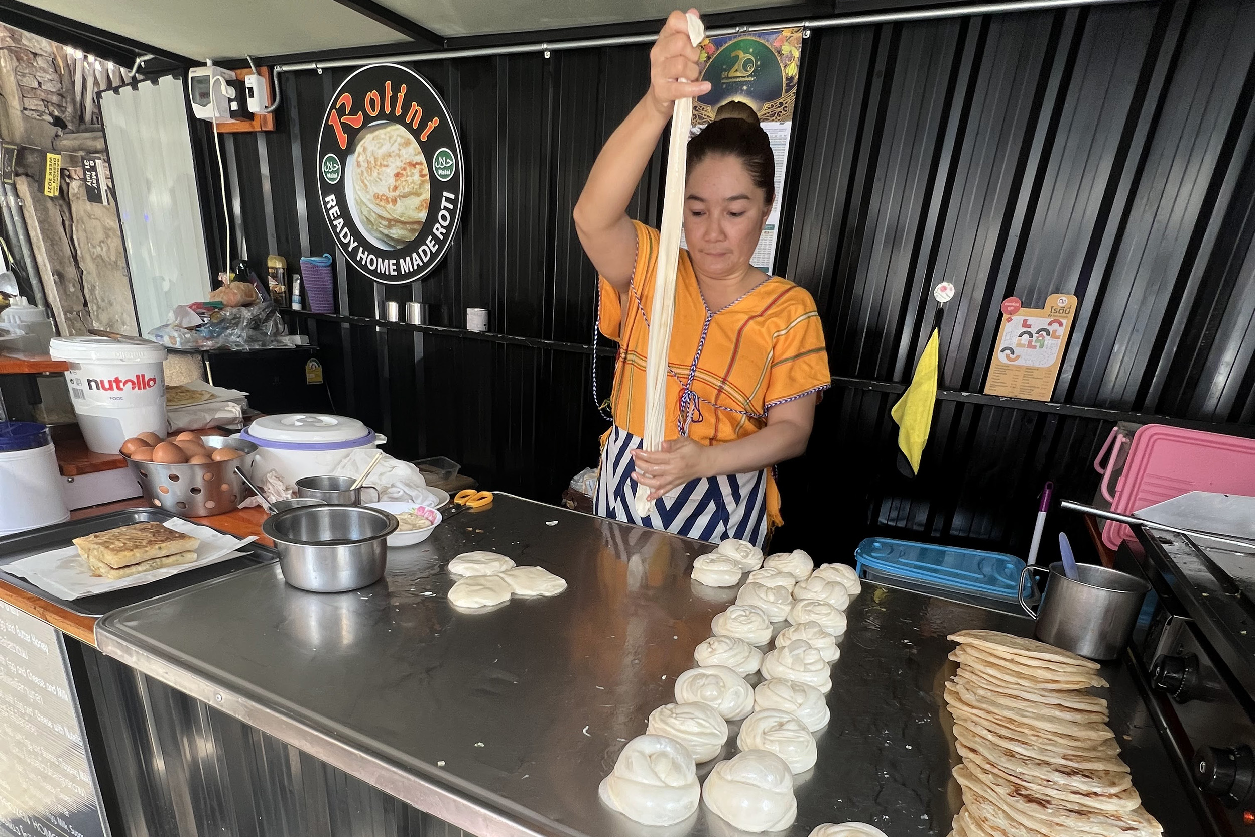 This is the lady who is making our Roti, our afternoon snack. It was kind of like a sweet bread thick tortilla with sweetened condensed milk wrapped up in it. They were very good.