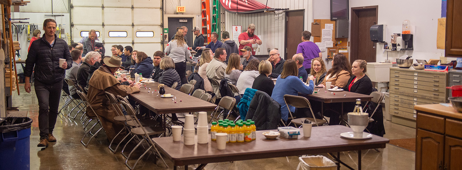 photo - The annual Campus Facilities pancake feed provides pancakes with syrup, sausage, eggs, coffee and orange juice to all HC employees each February since 1996.