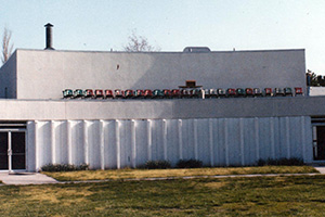 photo: Before HC's graduation in spring of 1975, students moved chairs from the graduation site, the lawn by Northlawn, to Northlawn's roof.