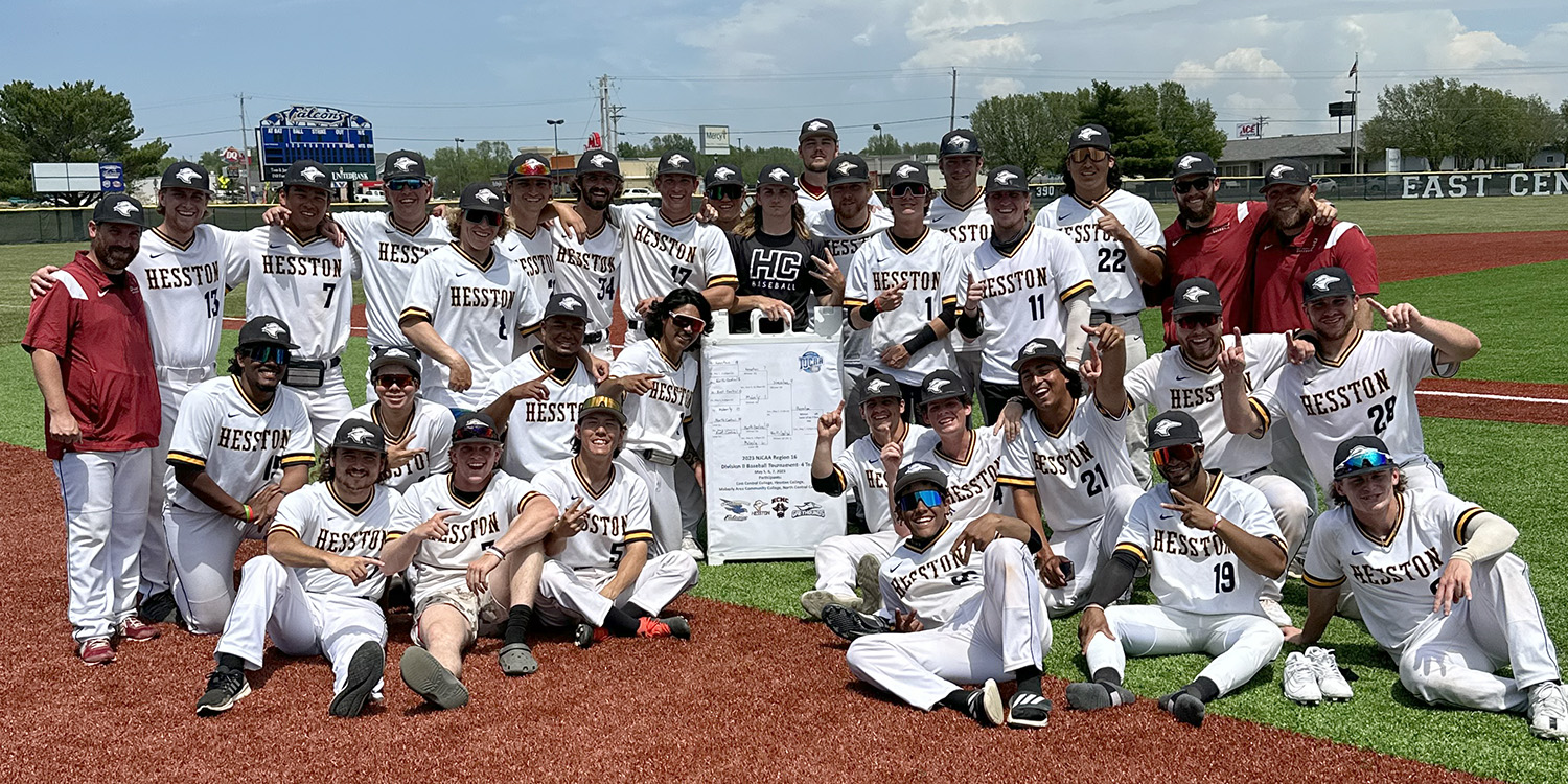 Hesston College Lark Baseball celebrates winning the Region 16 tournament with a team photo