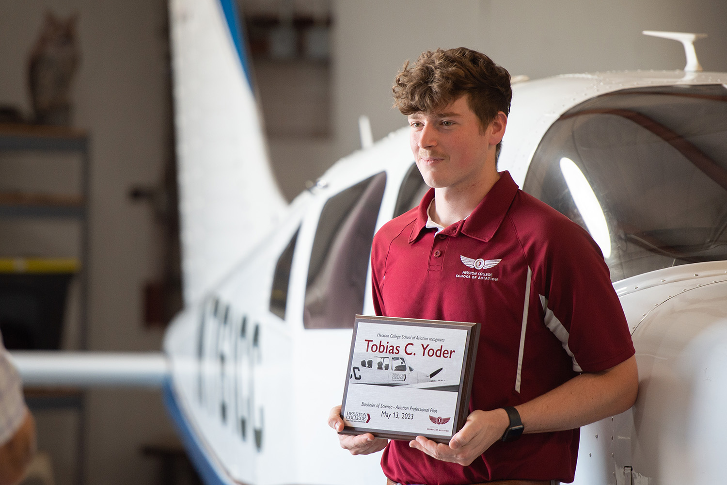 Bachelor's degree graduate Tobias Yoder at the 2023 Aviation Commencement open house