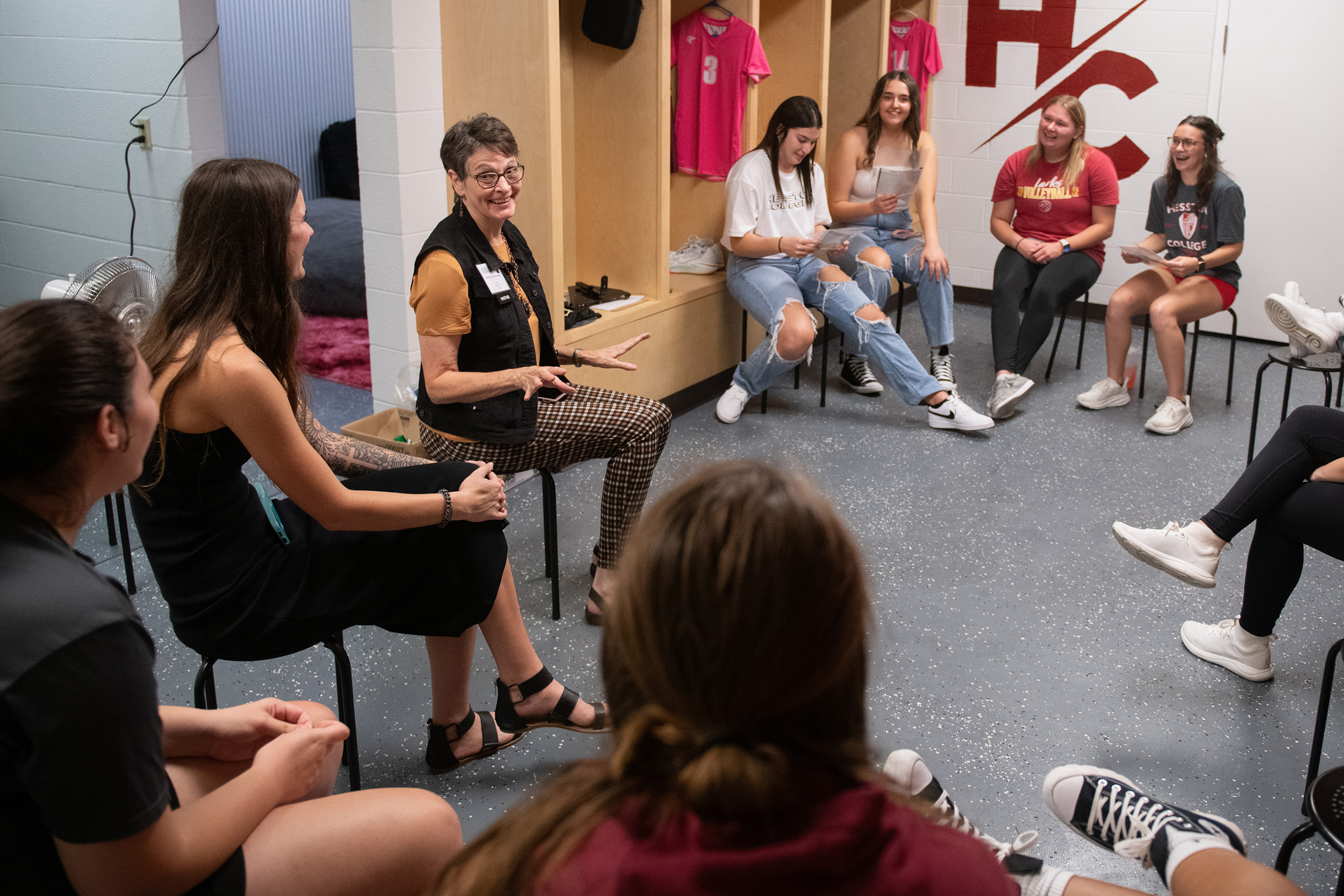 photo - Hesston College Homecoming 2023 - Athletics HoF inductees speak to teams - Beth Hostetler and volleyball