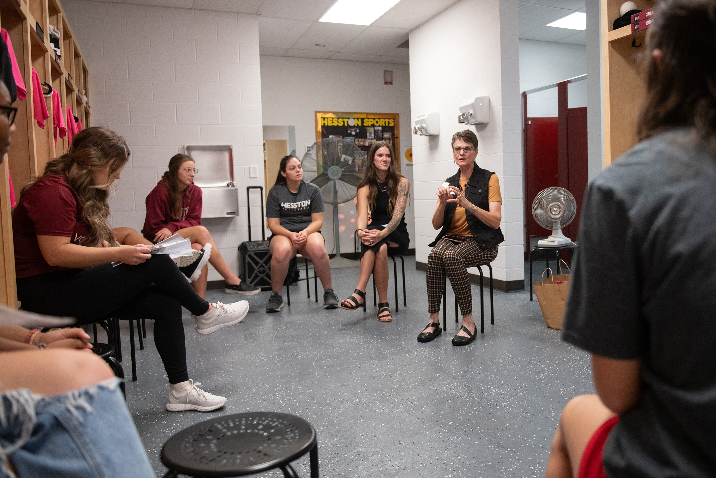 photo - Hesston College Homecoming 2023 - Athletics HoF inductees speak to teams - Beth Hostetler and volleyball