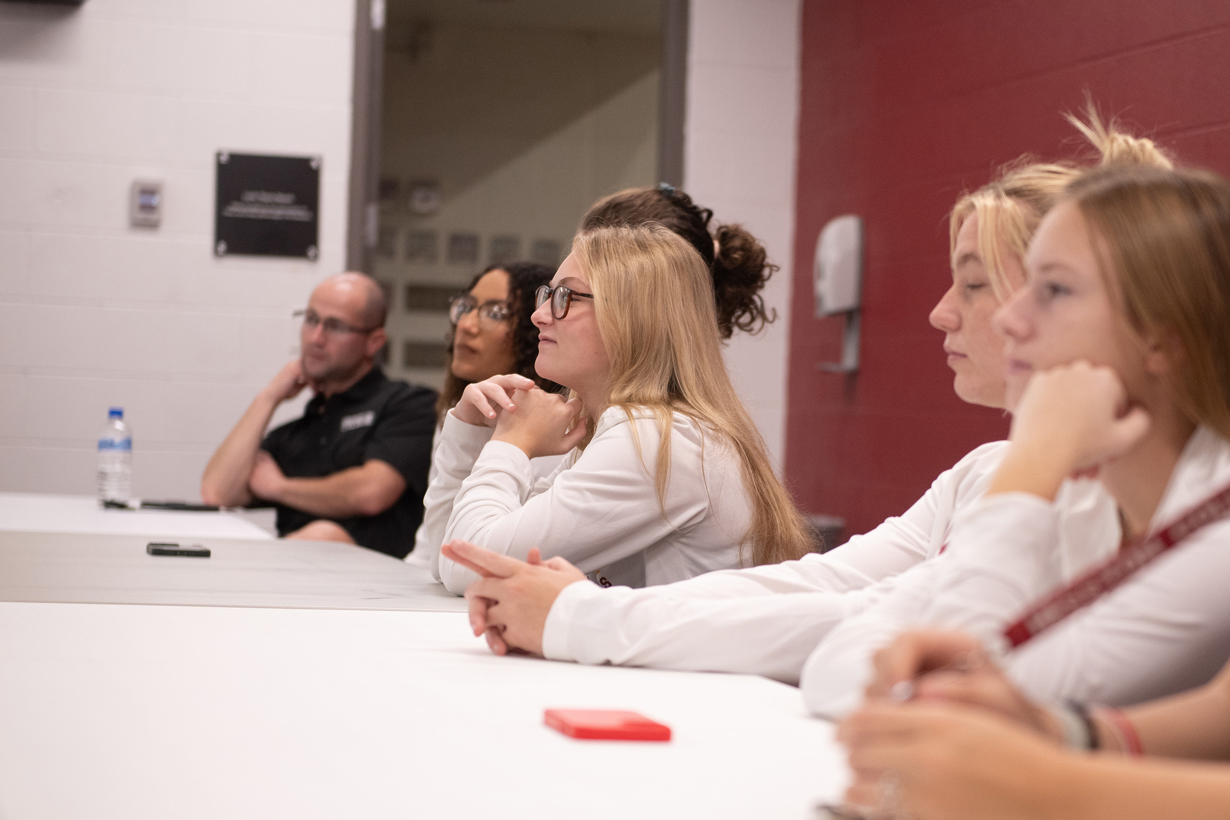 photo - Hesston College Homecoming 2023 - Athletics HoF inductees speak to teams - Lisa Schmidt and women's basketball