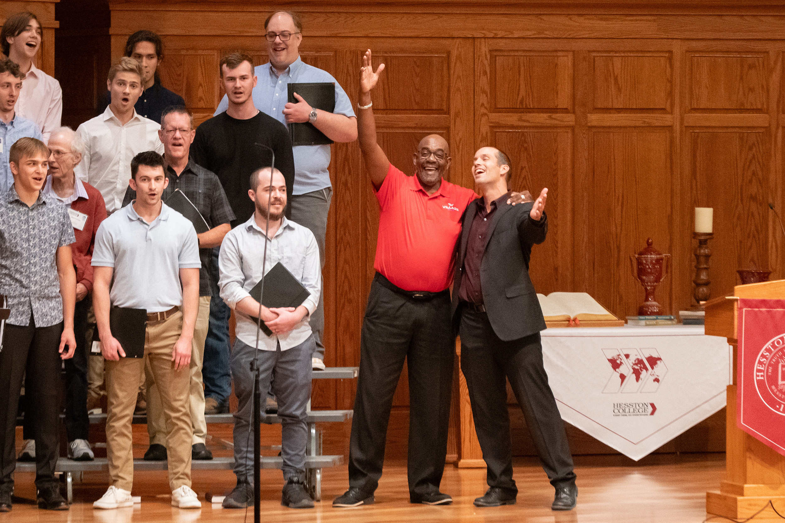 photo - Hesston College Homecoming 2023 - Bel Canto and alumni choir concert - bus driver Alvin Horn and conductor Russell Adrian