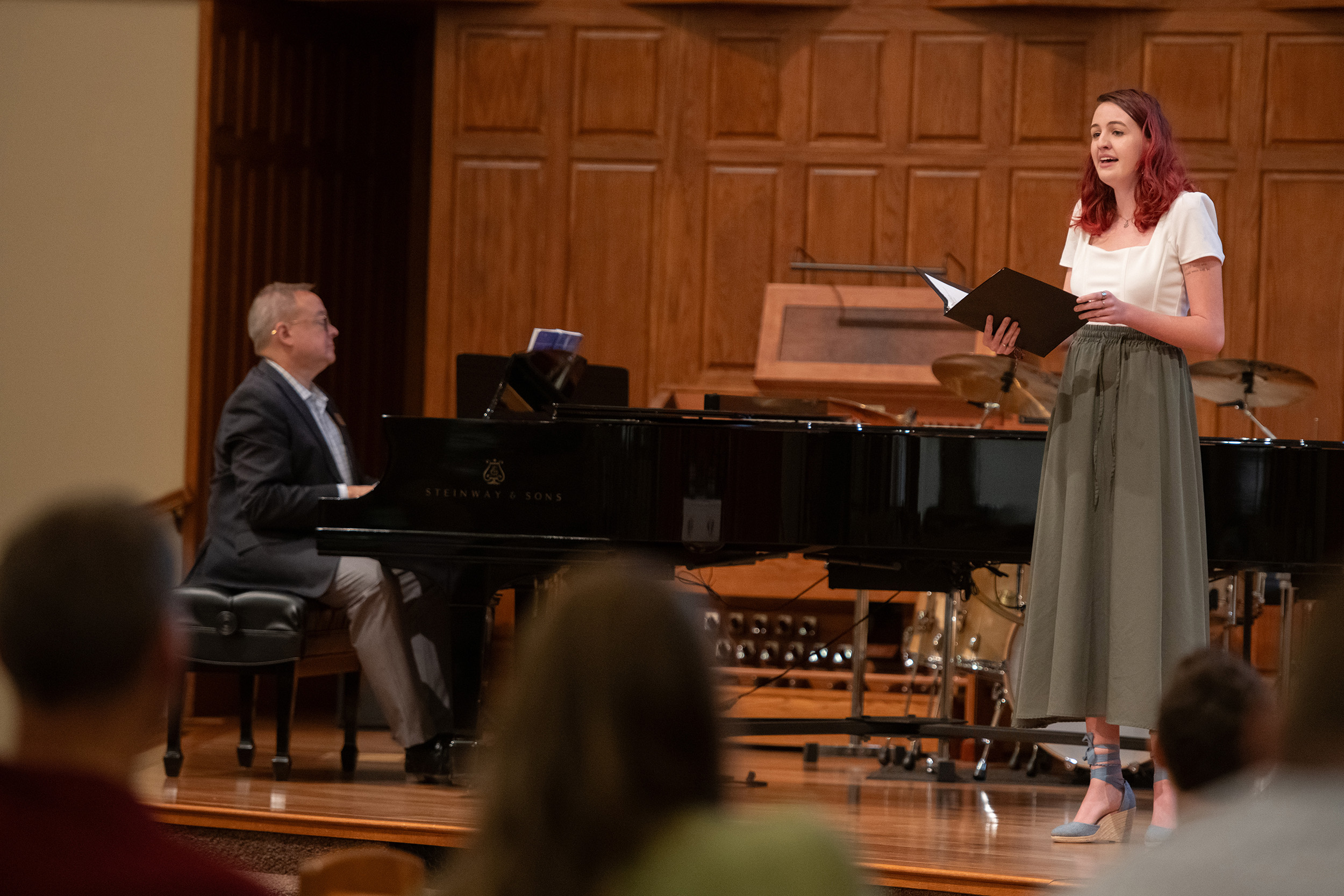 photo - Hesston College Homecoming 2023 - Partner Lunch - Meg Beyer sings a solo accompanied by Ken Rodgers