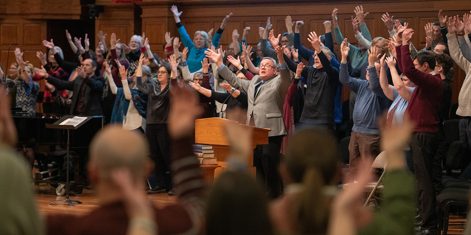 Music Professor Ken Rodgers lead a song at the Anabaptism at 500 Hymn Fest.